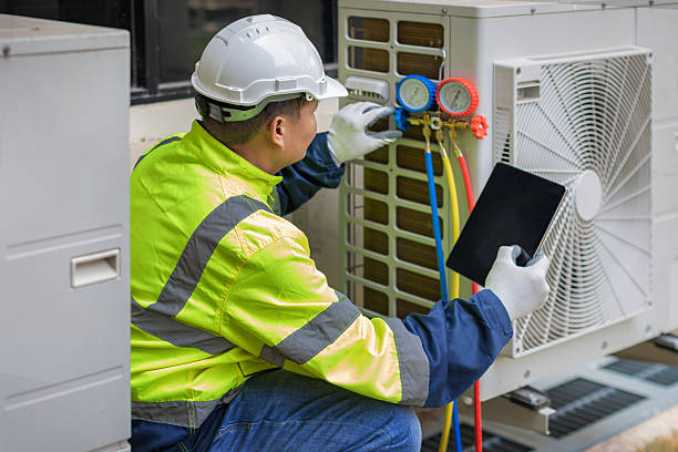 Professional Hvac technician working in Hiseville, KY